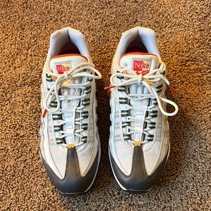 Nike Men's White and Black Sneakers with Red Accents